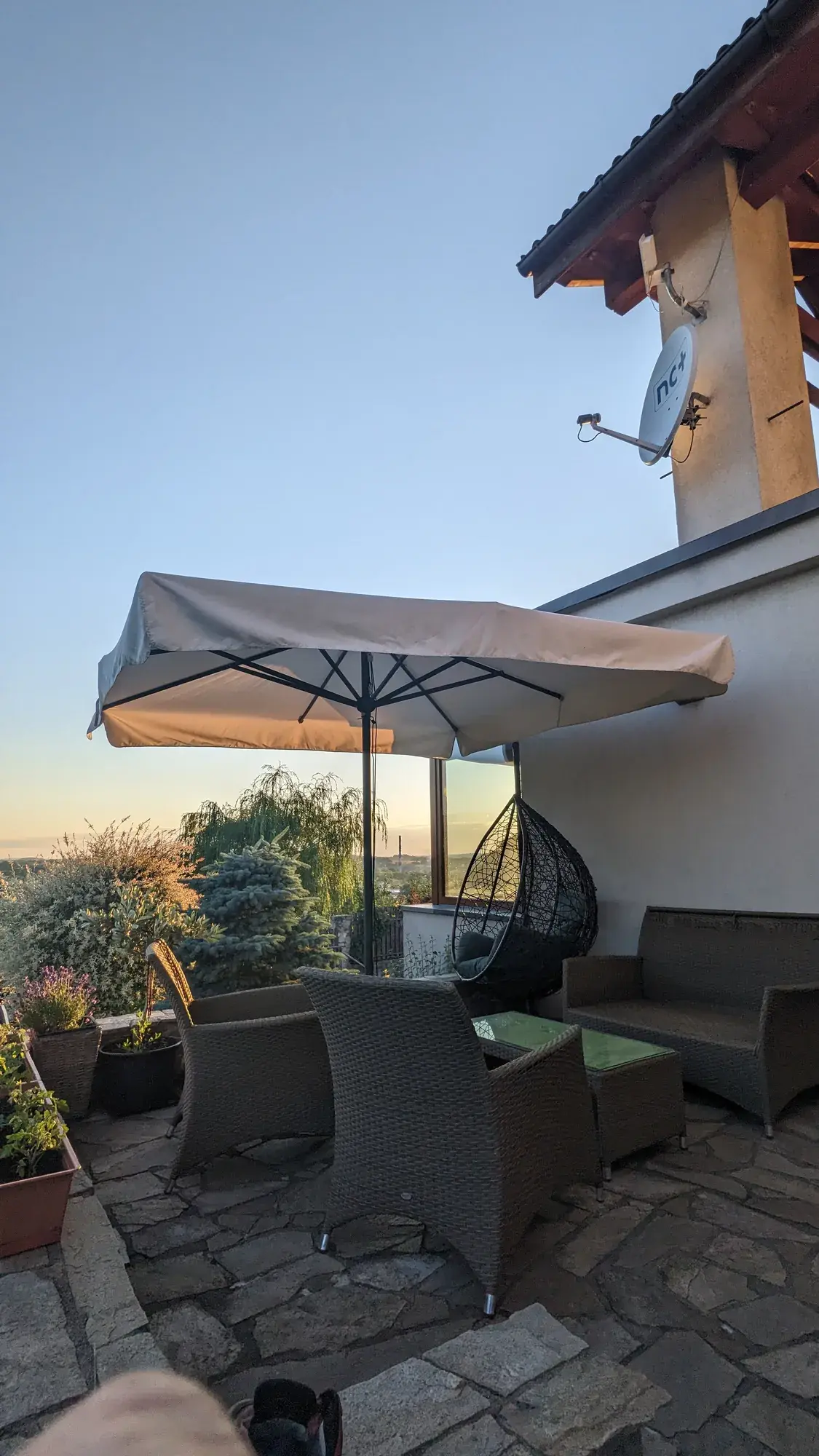 Palladio Standard over a table and armchairs on a terrace in Wisła